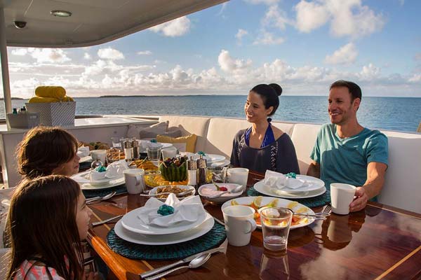 Enjoying food on a charter yacht